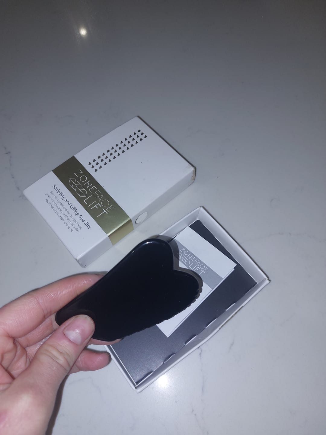 Customer photo review of Obsidian Jagged Edge Gua Sha