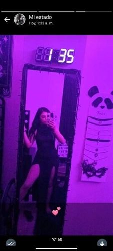 Customer photo review of Hoodie sleeveless slit hollow out self tie cowl neck maxi dress