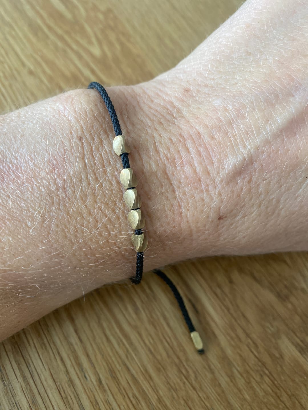 Customer photo review of Handgemachtes Tibetisches Glücks-Armband aus Kupfer
