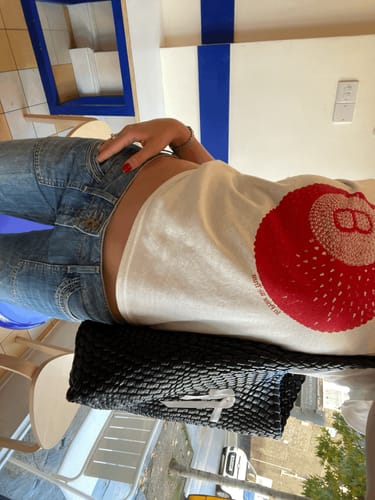 Customer photo review of 'Lucky Shot' baby tee