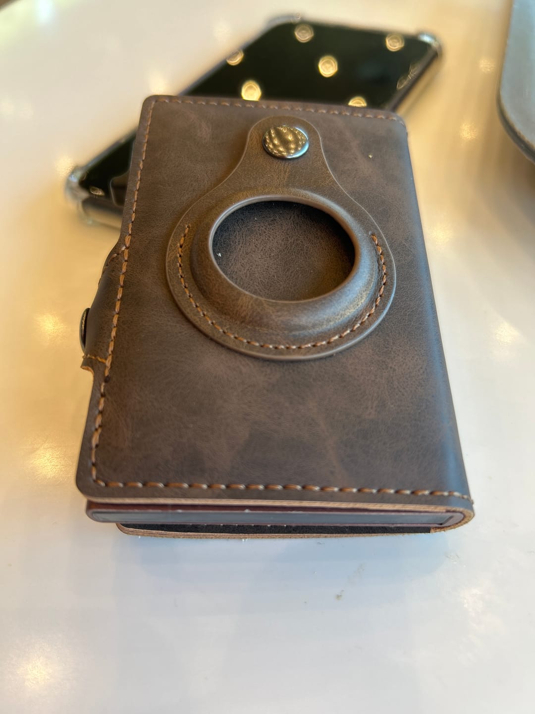 Customer photo review of Dark Brown Airtag