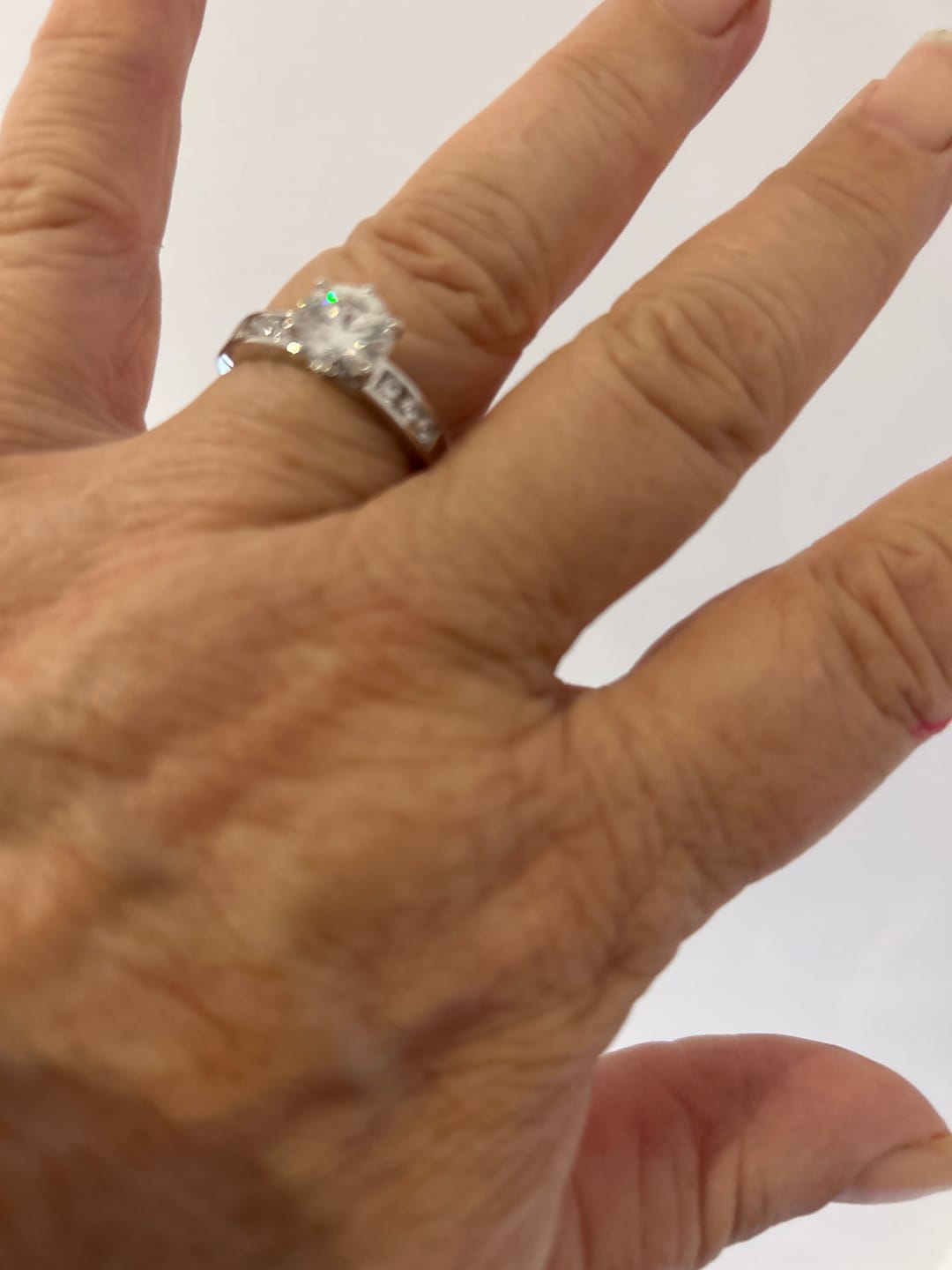 Customer photo review of Round Moissanite Pavé Accents Engagement Ring