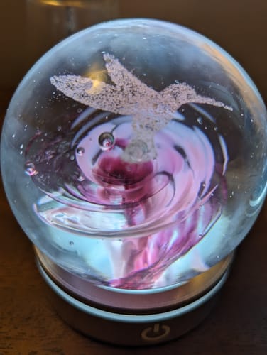 Customer photo review of Hummingbird Snowfall Orb with Cremation Ash