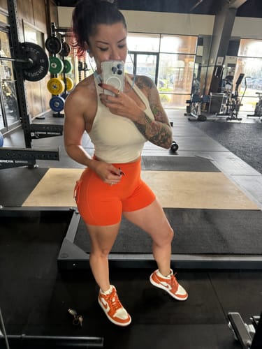 Customer photo review of Orange Pocket Scrunch Butt Shorts