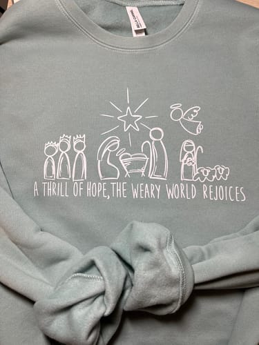 Customer photo review of THE WEARY WORLD REJOICES DTF Transfer