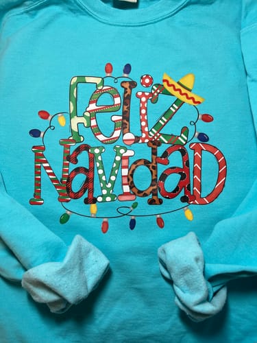 Customer photo review of Feliz Navidad DTF Transfer