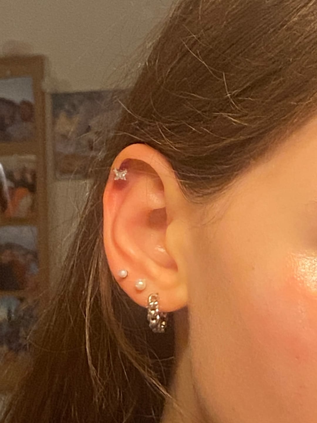 Customer photo review of Butterfly Piercing | Titan