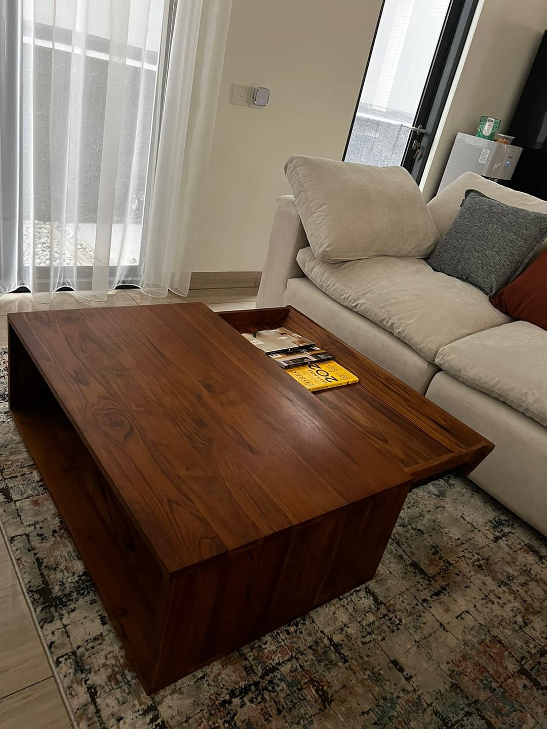 Customer photo review of Timeless Teak Coffee Table with Seamless Storage