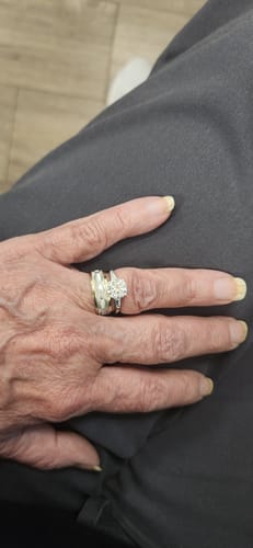 Customer photo review of Three Stone Round Moissanite Tapered Baguette Engagement Ring