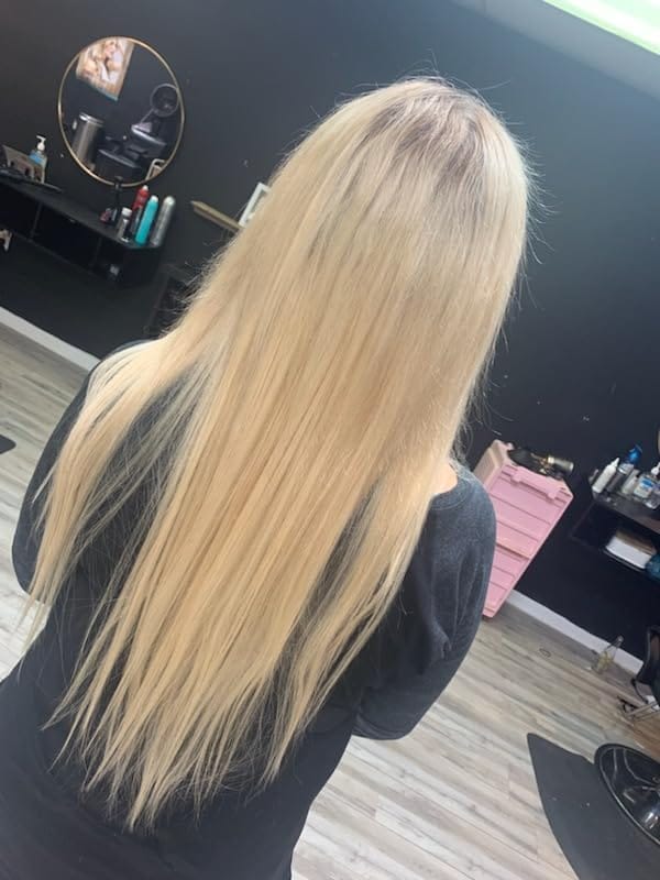 Customer photo review of Seamless Tape in Hair Extensions Best Virgin Hair Lightest Blonde #60