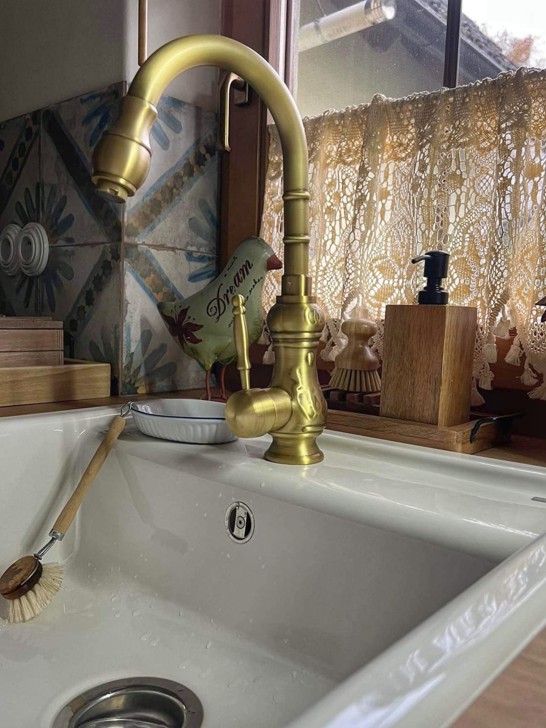 Customer photo review of Unlacquered Antique Brass Design Kitchen Faucet