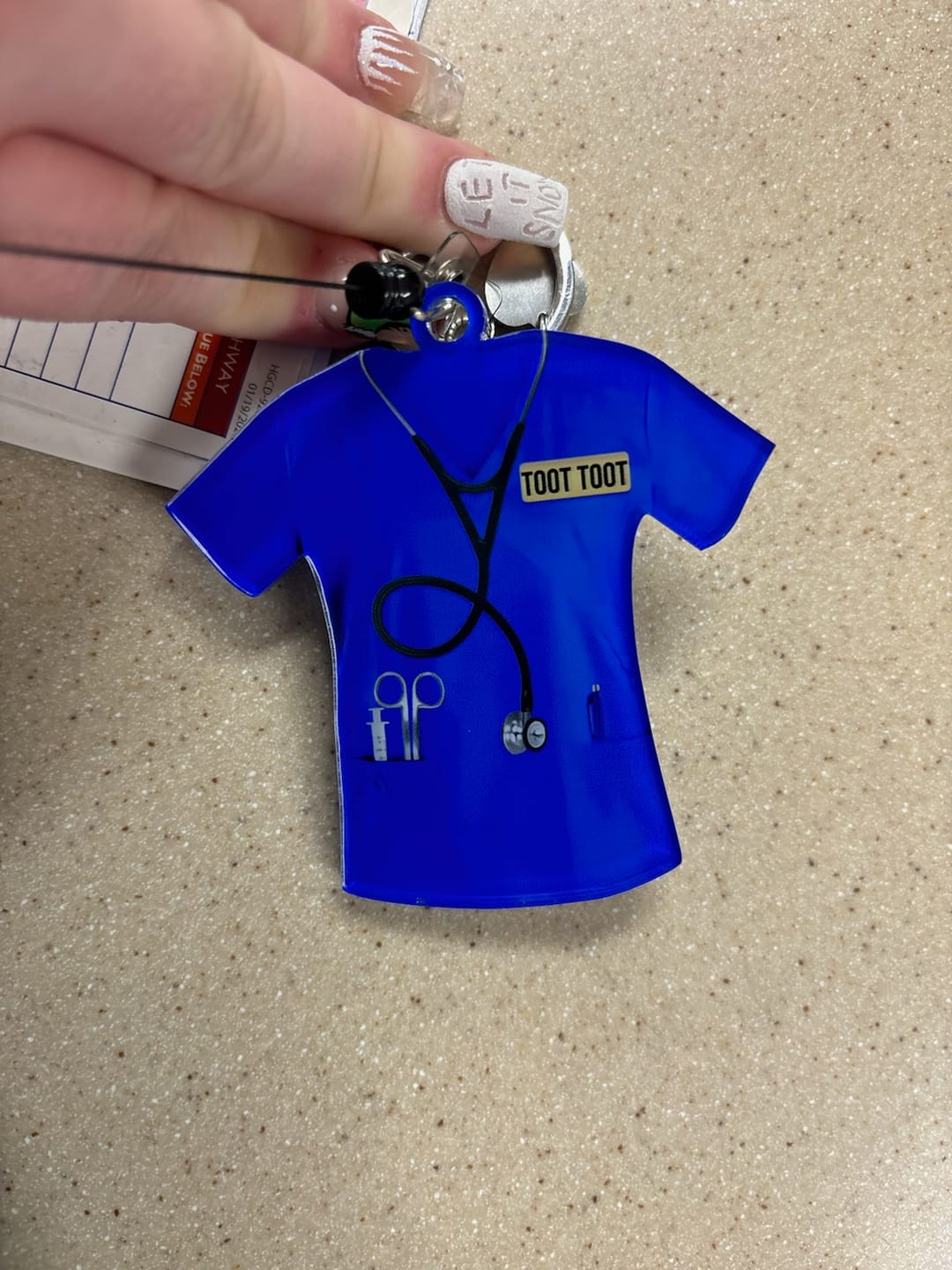 Customer photo review of Personalized Nurse Scrubs - Gift for Nurse Ornament