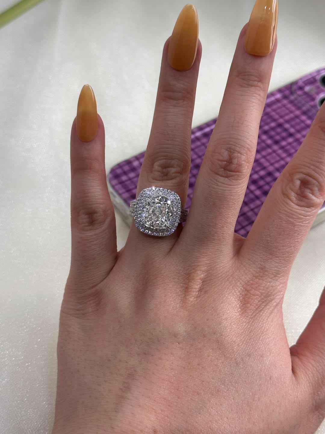 Customer photo review of Louily Luxury Double Halo Three Shank Cushion Cut Engagement Ring