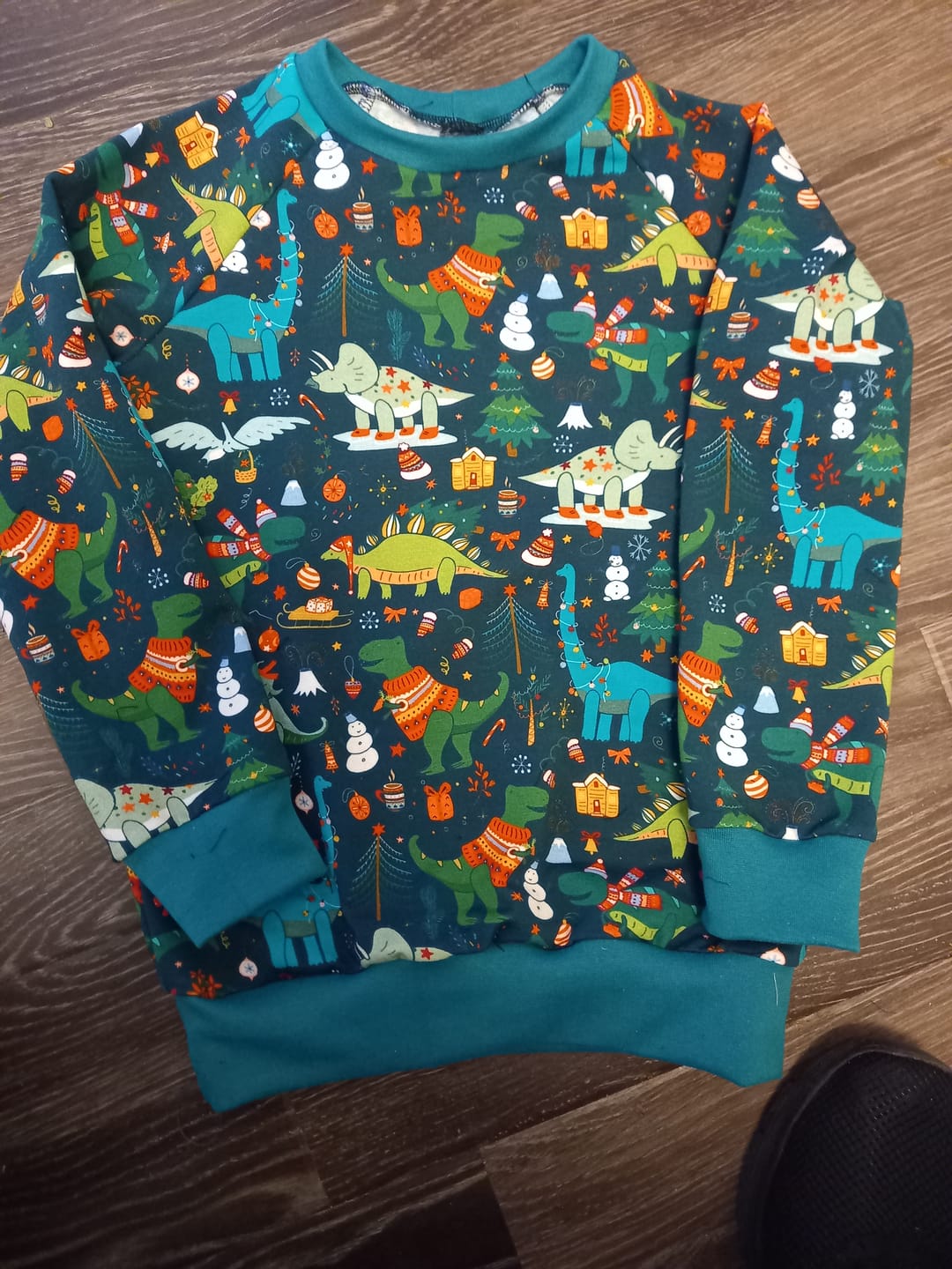 Customer photo review of Christmas Dinosaurs on Dark Teal French Terry Fabric