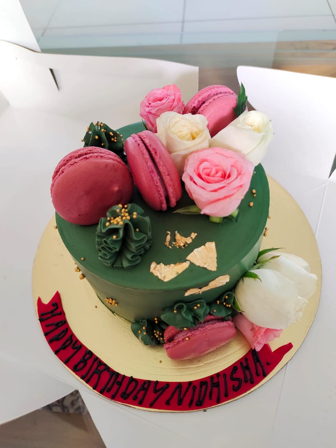 Customer photo review of Bottle Green Floral Cake