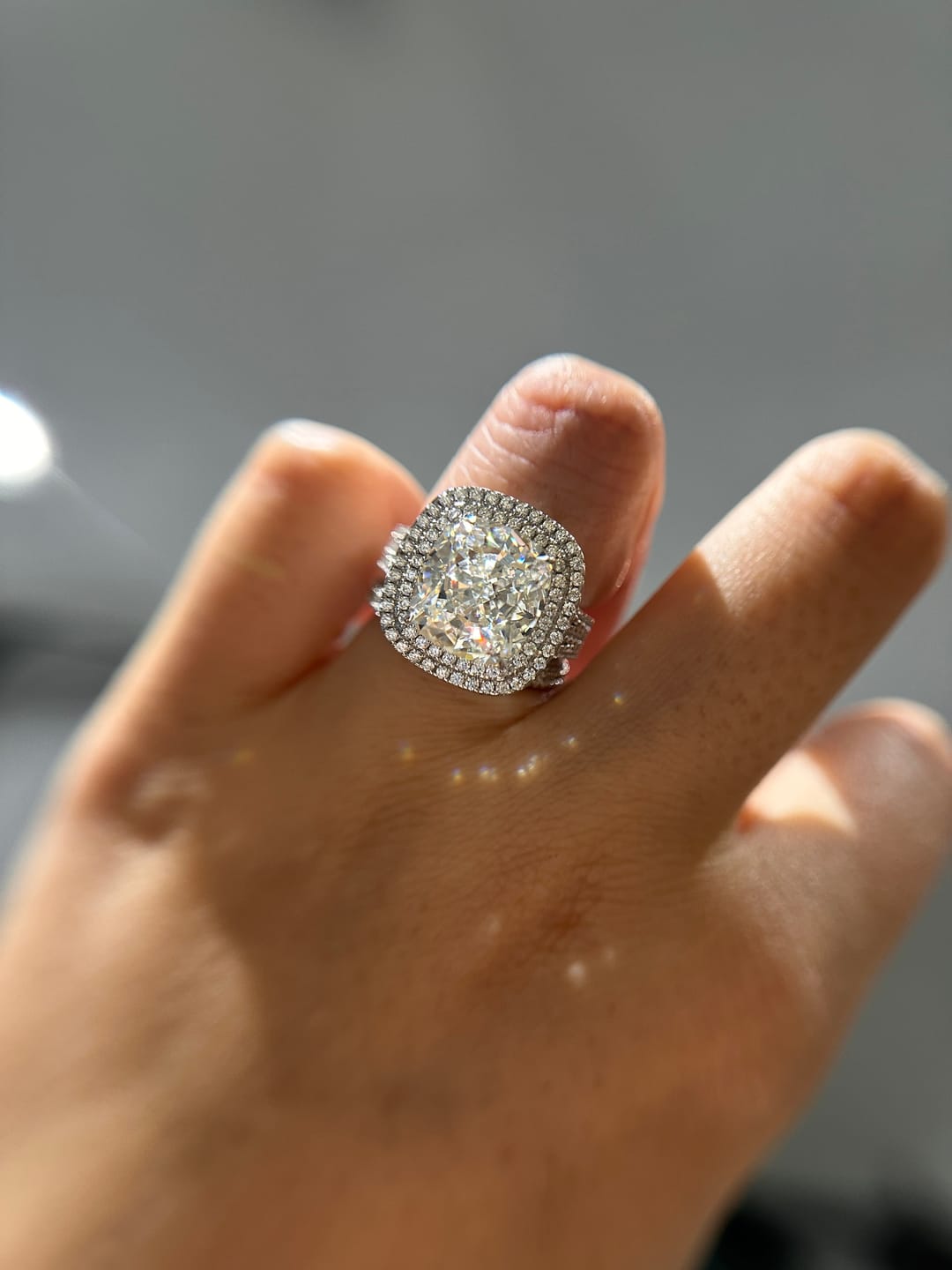 Customer photo review of Louily Luxury Double Halo Three Shank Cushion Cut Engagement Ring