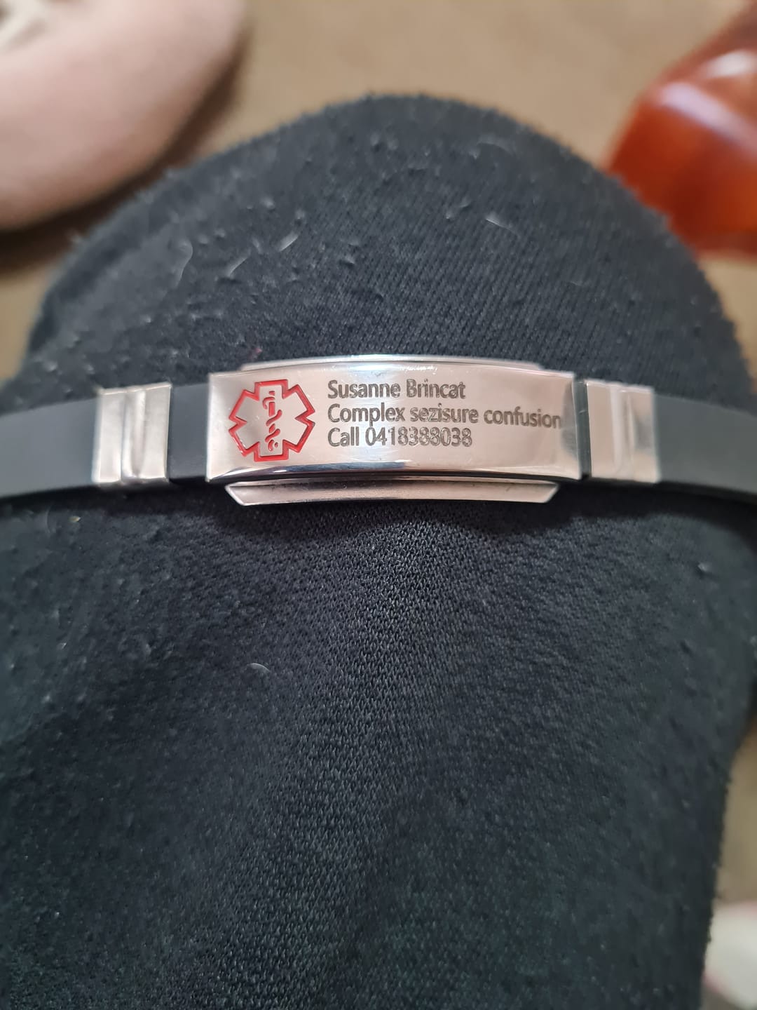 Customer photo review of Personalised Black Silicone Medical Alert ID Bracelet