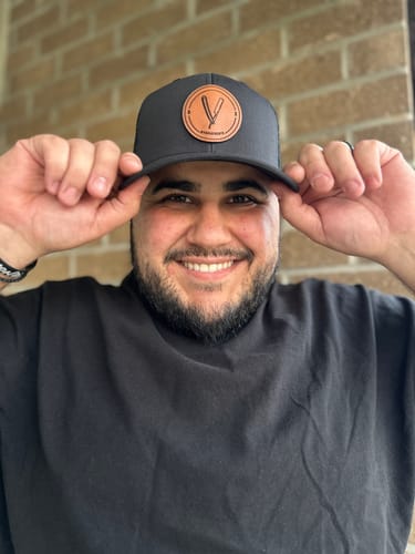 Customer photo review of Custom Leather Patch Trucker Hat - Richardson 112