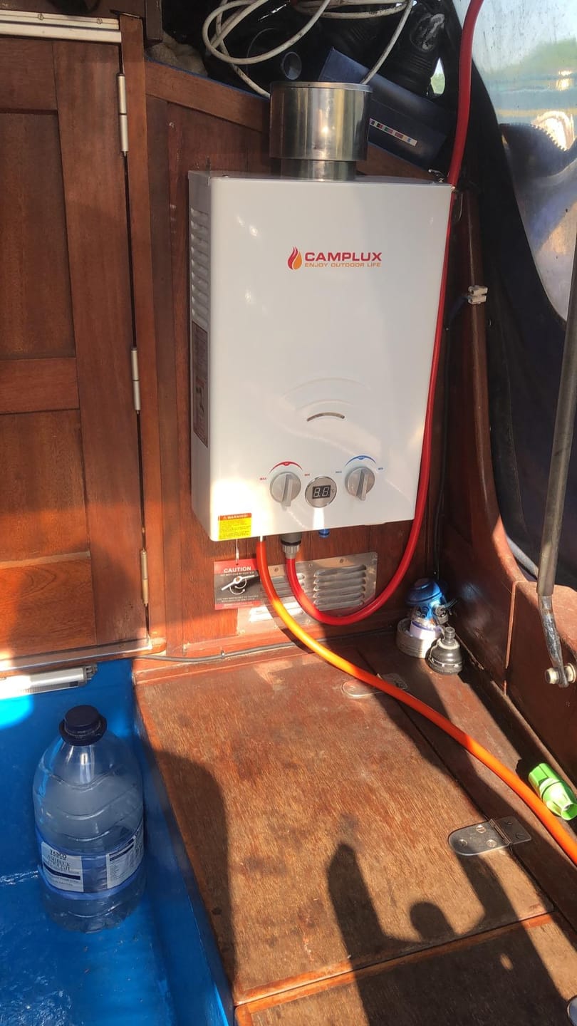 Customer photo review of Camplux BW158C 6L Tankless Gas Portable Water Heater with Rain Cap,Instant Gas Propane Shower For Horse Camping RV Trip