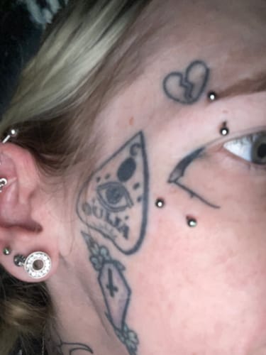 Customer photo review of Double Gem Steel Curved Eyebrow Ring