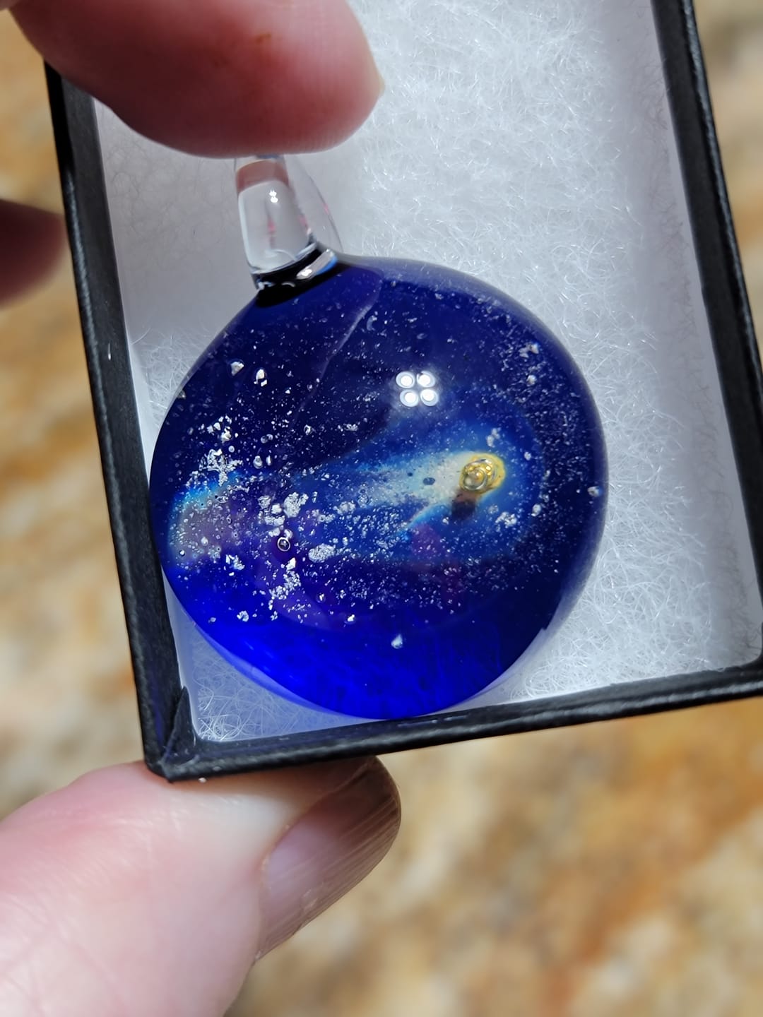 Customer photo review of Halley's Comet Glass Pendant