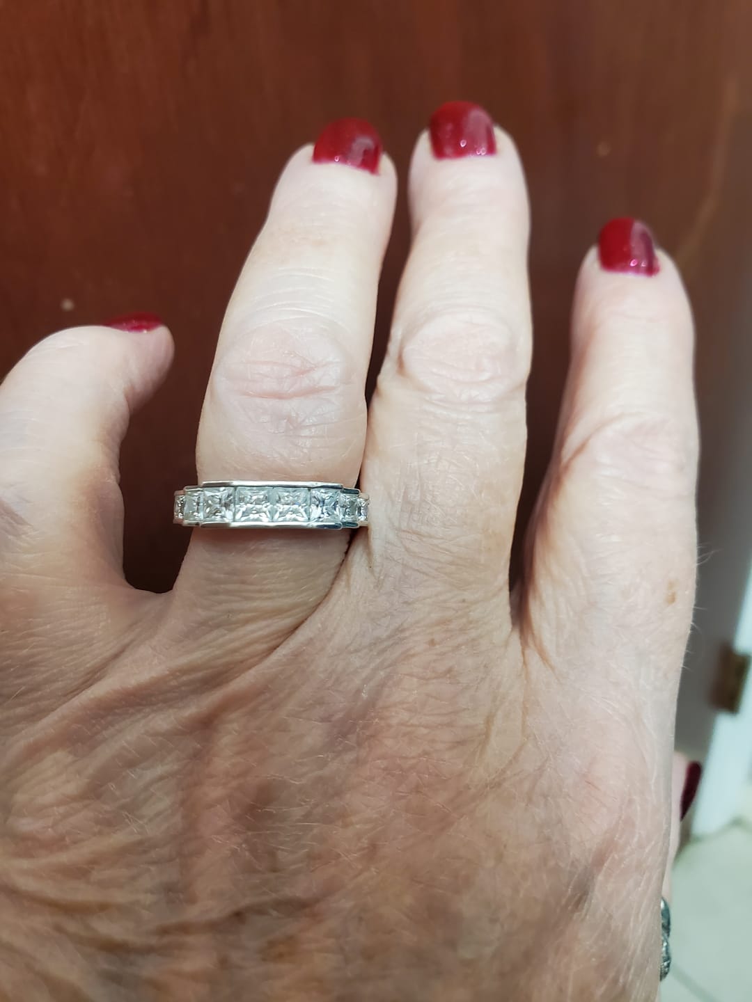 Customer photo review of Princess Moissanite Staircase Channel Set Half Eternity Wedding Band
