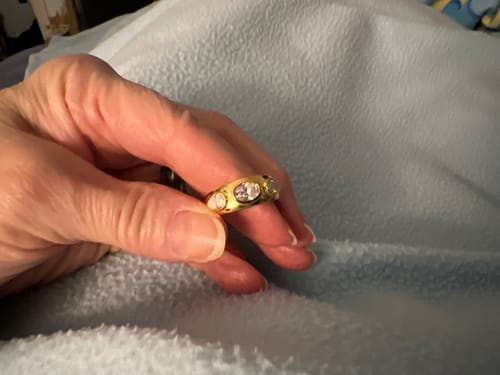 Customer photo review of Three Stone Oval And Pear Moissanite Engagement Ring