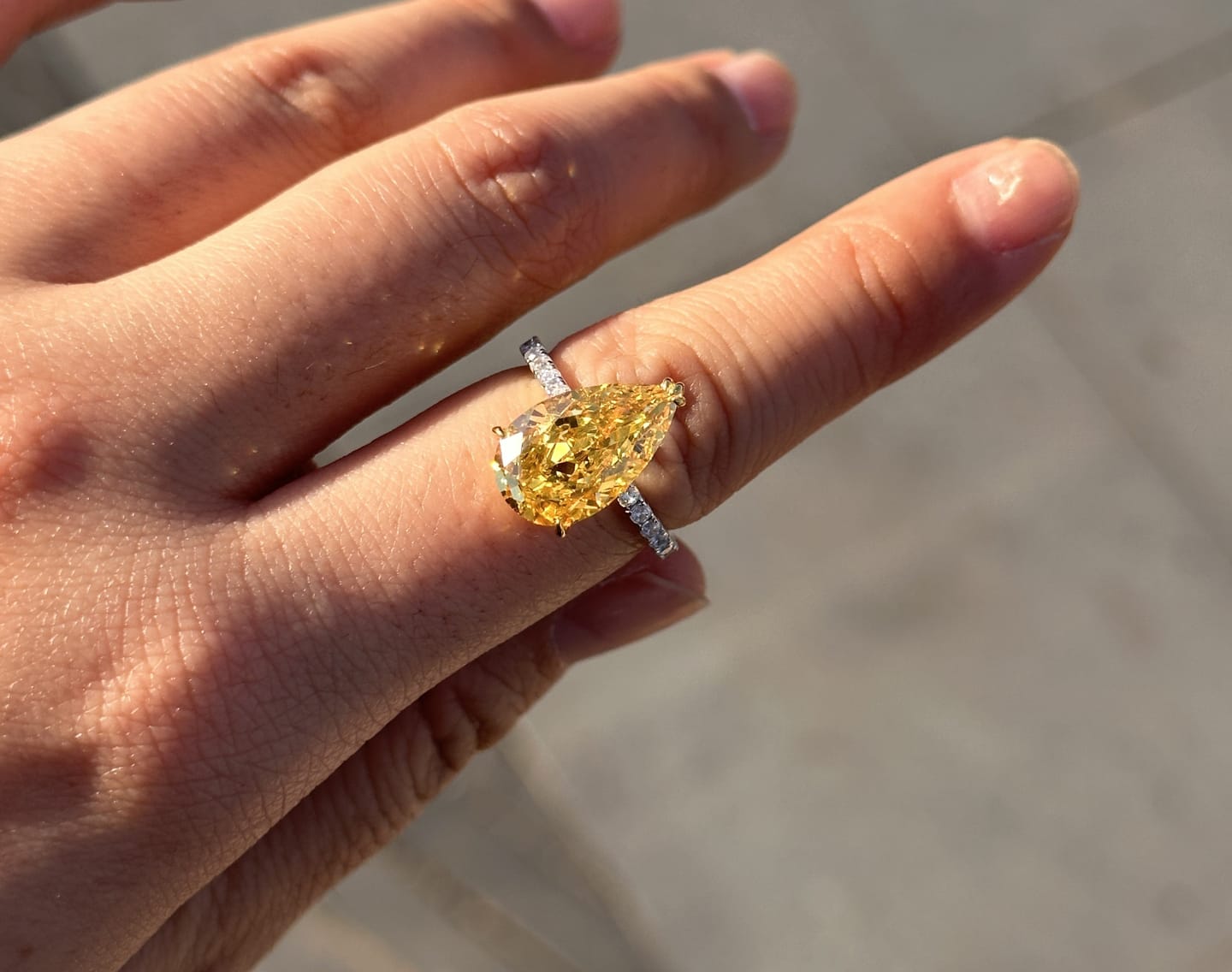 Customer photo review of Louily Gorgeous Two-tone Pear Cut Yellow Sapphire Engagement Ring