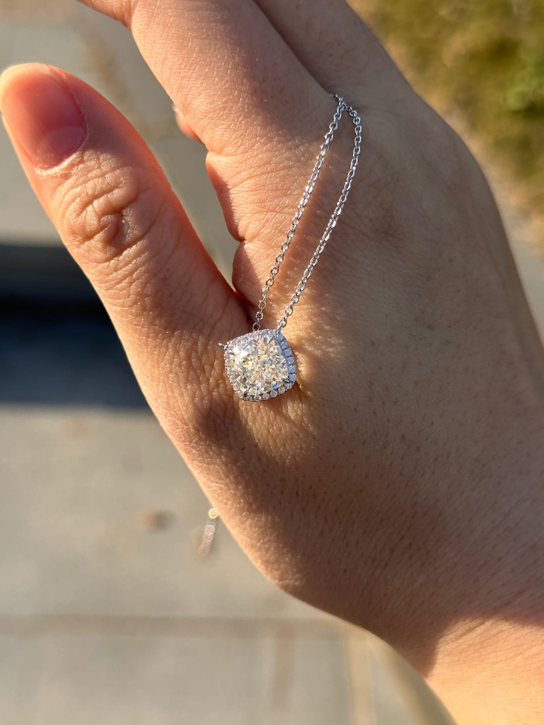 Customer photo review of S925 Moissanite Elegant Halo Cushion Cut Pendant Necklace