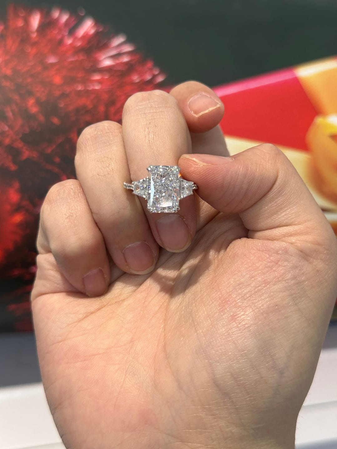 Customer photo review of Louily Gorgeous Three Stone Crushed Ice Radiant Cut Engagement Ring