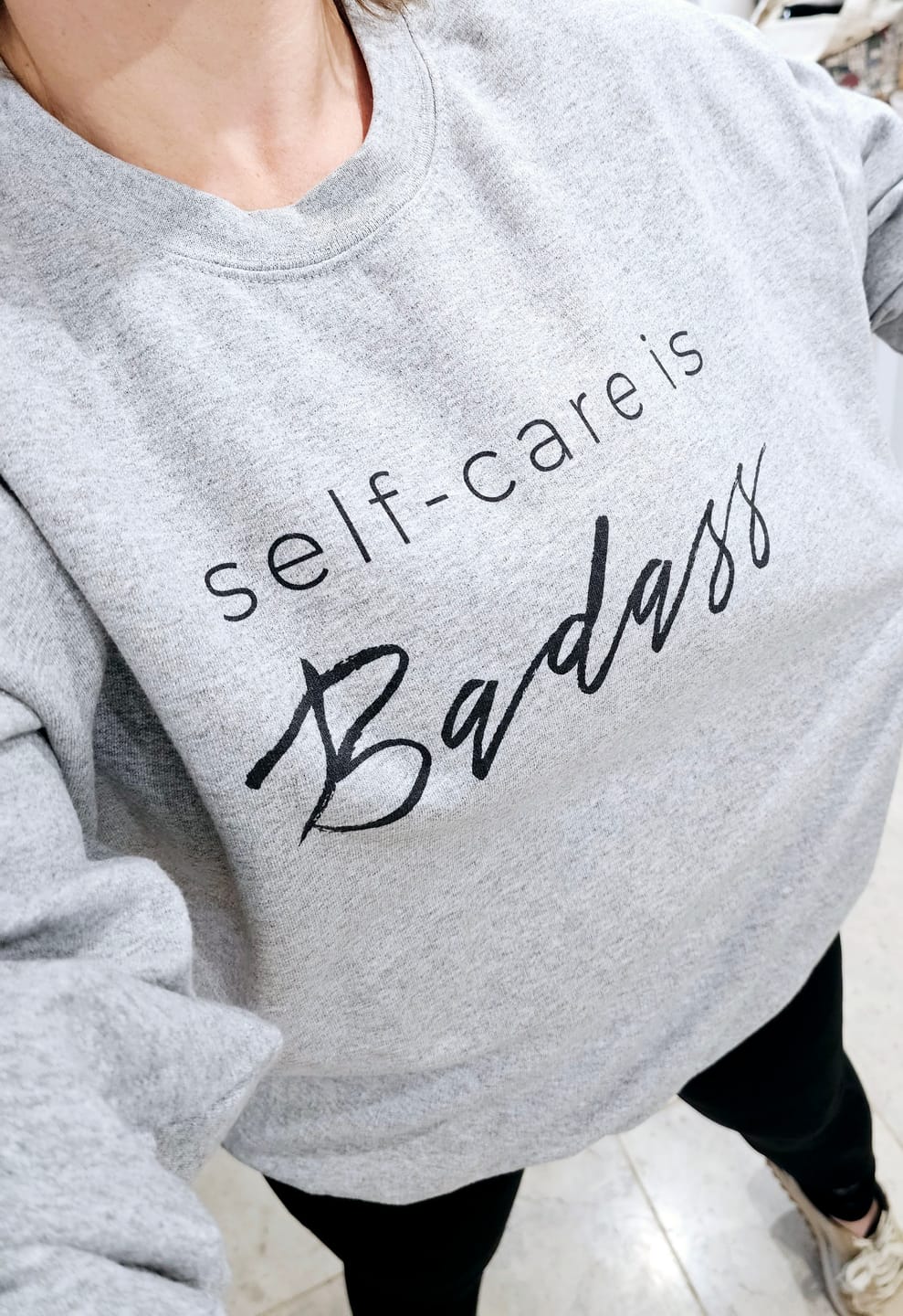 Customer photo review of Self-Care Is Badass Sweatshirt