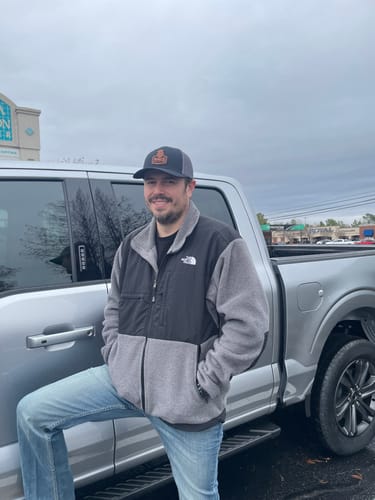 Customer photo review of Custom Leather Patch Trucker Hat - Richardson 115