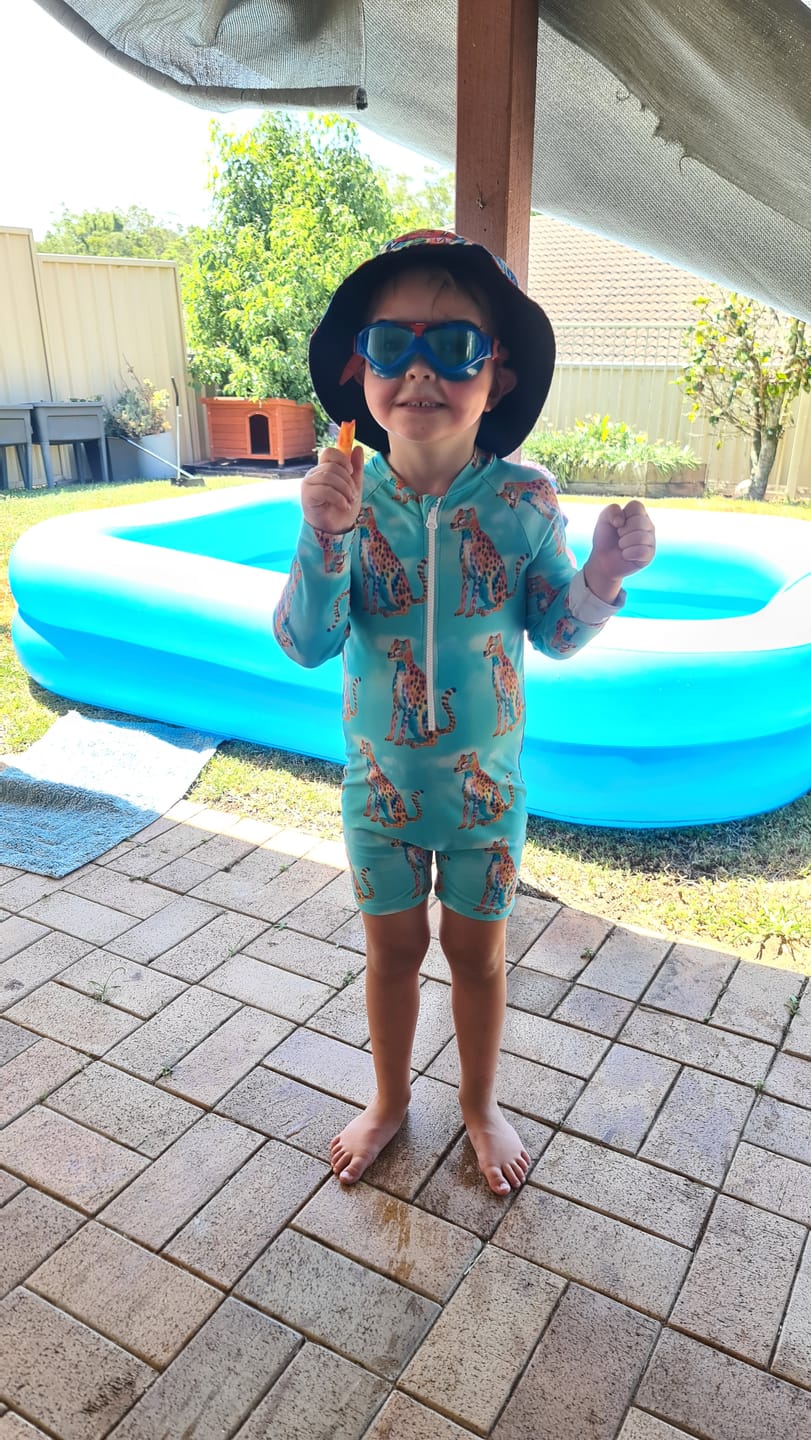 Customer photo review of Shimmering Cheetah Unisex Long Sleeve Zip Swimmers