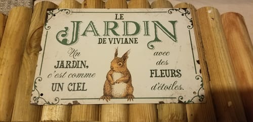 Customer photo review of Pancarte personnalisée - Avoir un beau jardin, c'est déjà vivre dans son paradis.