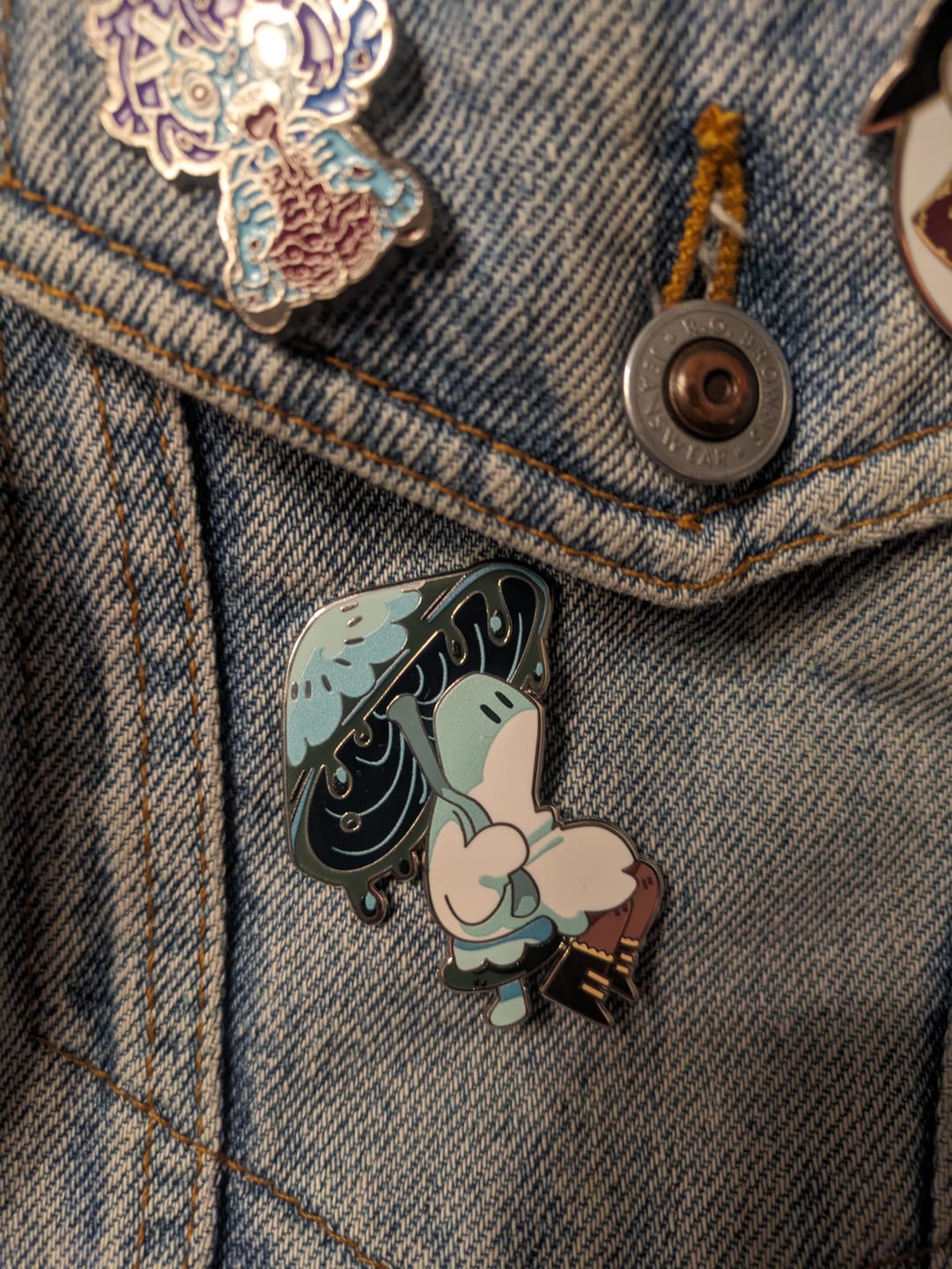 Customer photo review of Blue Mushroom Ghost Enamel Pin 2in