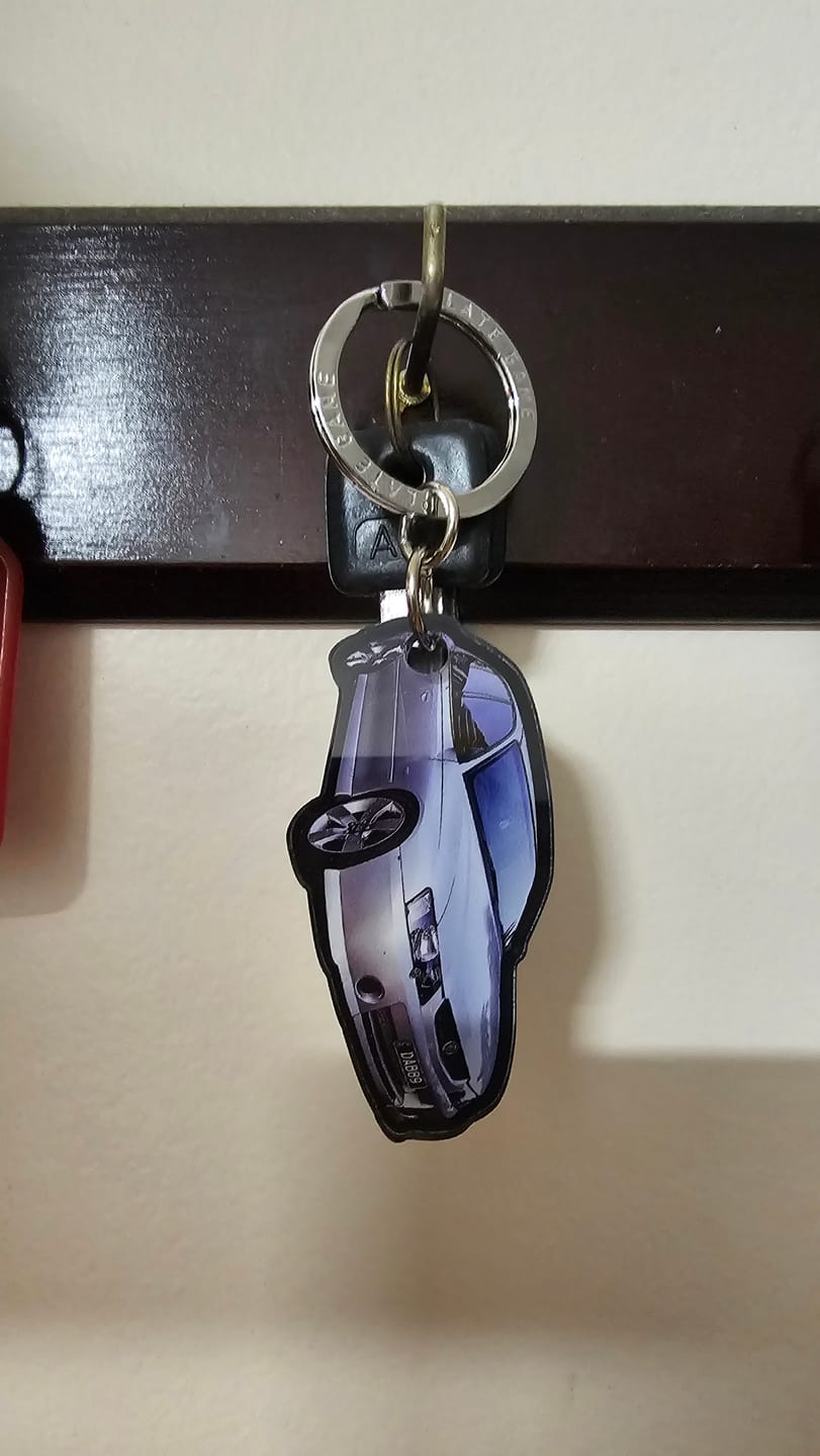 Customer photo review of PG Mini Custom Keychain