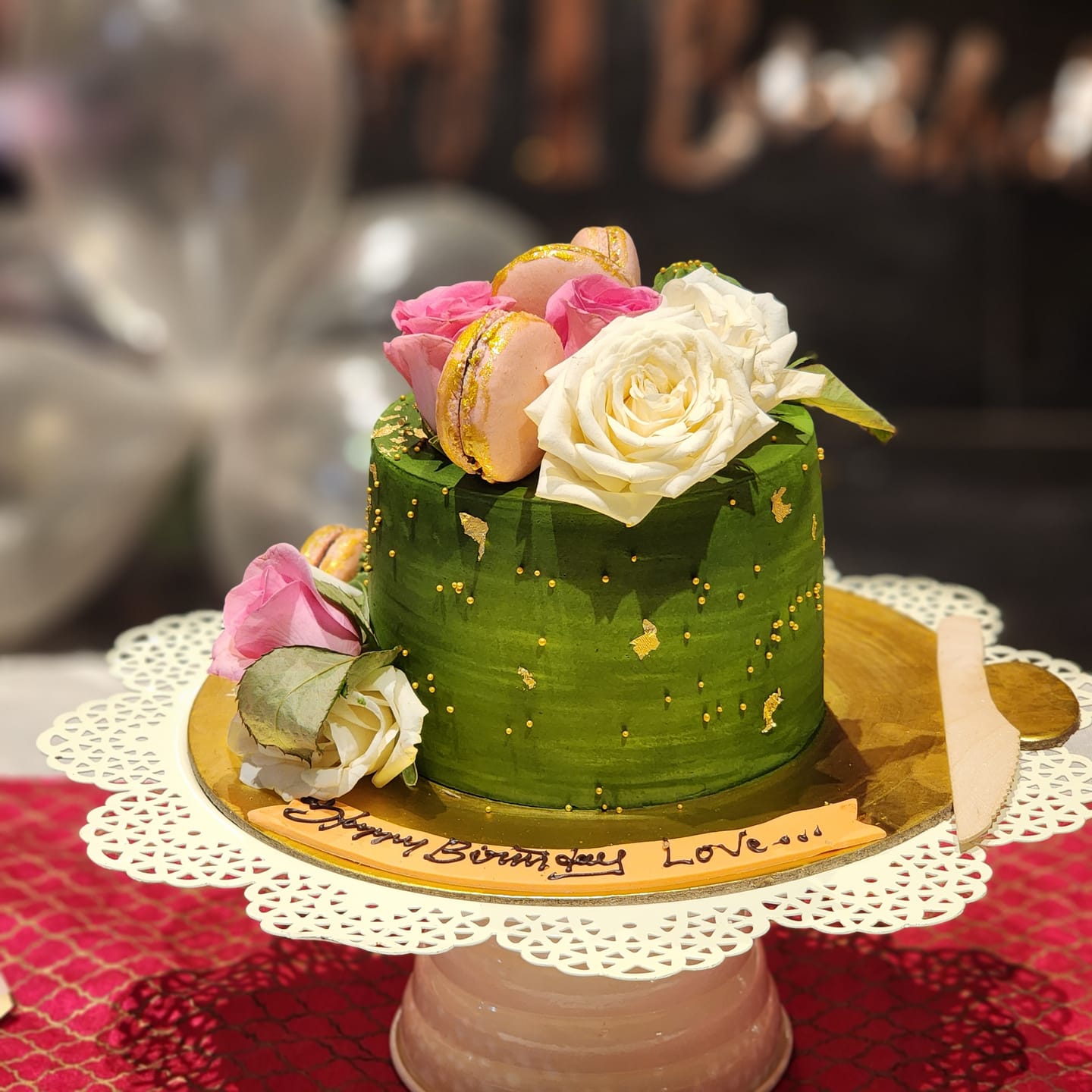 Customer photo review of Bottle Green Floral Cake