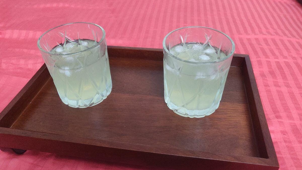 Customer photo review of Serving Tray with Metal Stand from Mahogany Collection (Large)