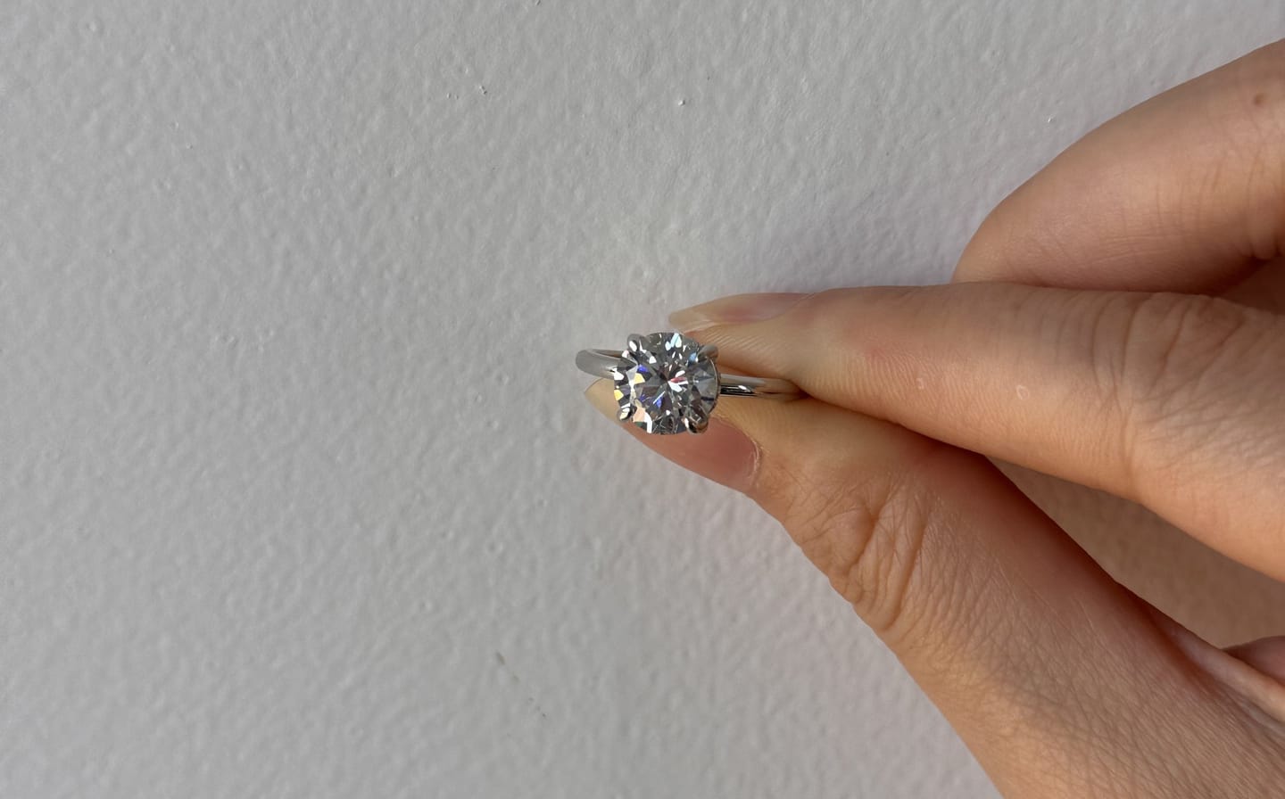 Customer photo review of Louily Classic Round Cut Engagement Ring For Women In Sterling Silver