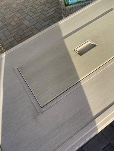 Customer photo review of 44 in Propane Fire Pit with Aluminum Table Top and Glass Wind Guard, Brown