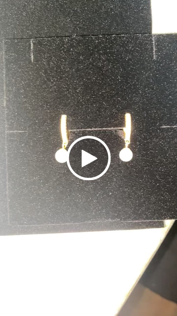 Customer video review of Crystal Pearl Hoops in Gold