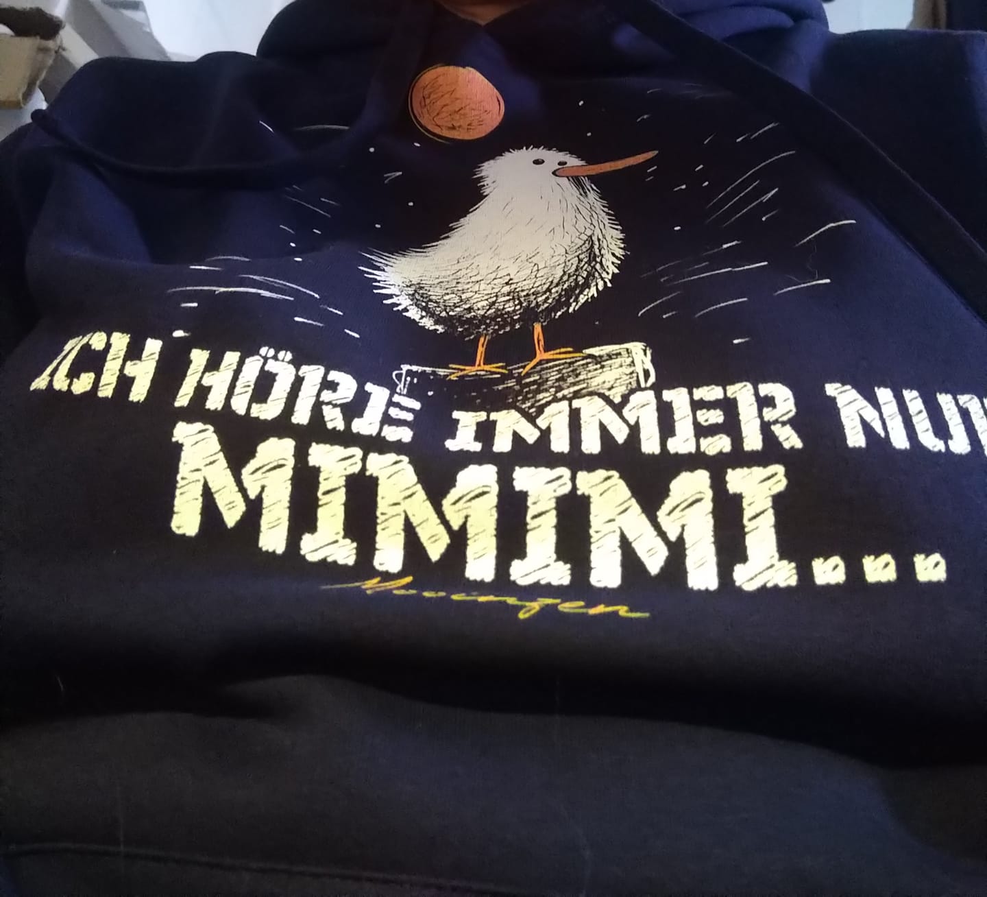 Customer photo review of Ich höre immer nur Mimimi  · Unisex Bio Hoodie