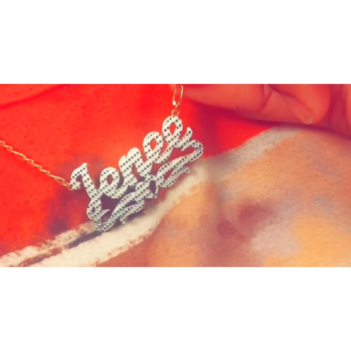 Customer photo review of Double Plated Heart Twirl Name Necklace w/ Figaro Chain