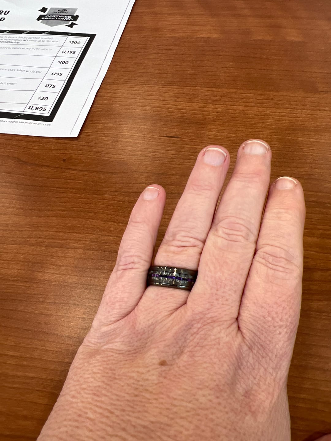 Customer photo review of 8mm - Tungsten Gunmetal wedding Rings, Carbon Fiber W/ Purple Wood Wedding Band