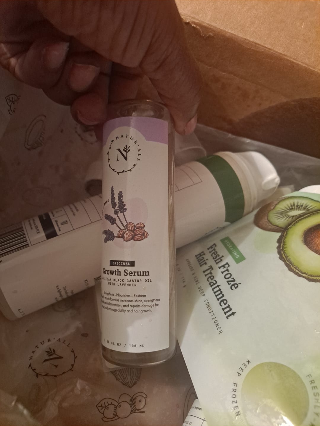 Customer photo review of Original Jamaican Black Castor Oil Growth Serum