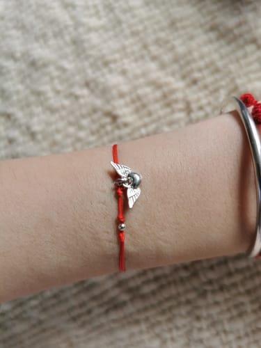 Customer photo review of PULSERA  NIÑO/A HILO ROJO CORAZÓN ALADO PLATA