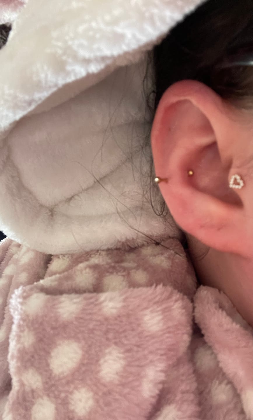 Customer photo review of Heart Piercing | Titan