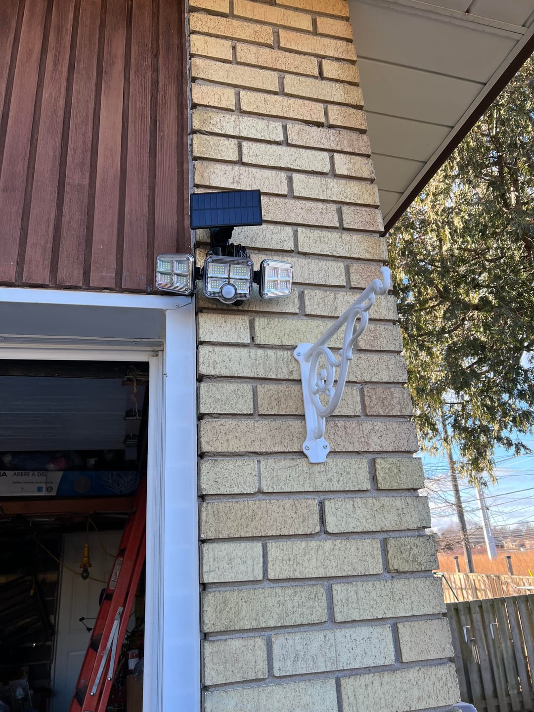 Customer photo review of BigM 122 LED Adjustable Waterproof Solar Security Motion Sensor Light For Garage Doors, Backyard, Pool sides, Front Entrance, Side Entrance