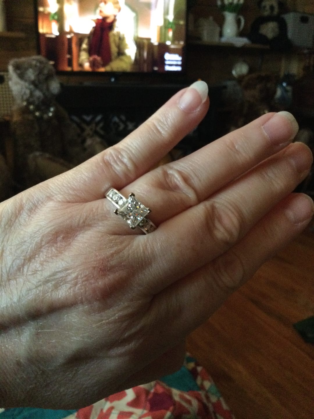 Customer photo review of Princess Cut Moissanite With Round Channel Set Engagement Ring