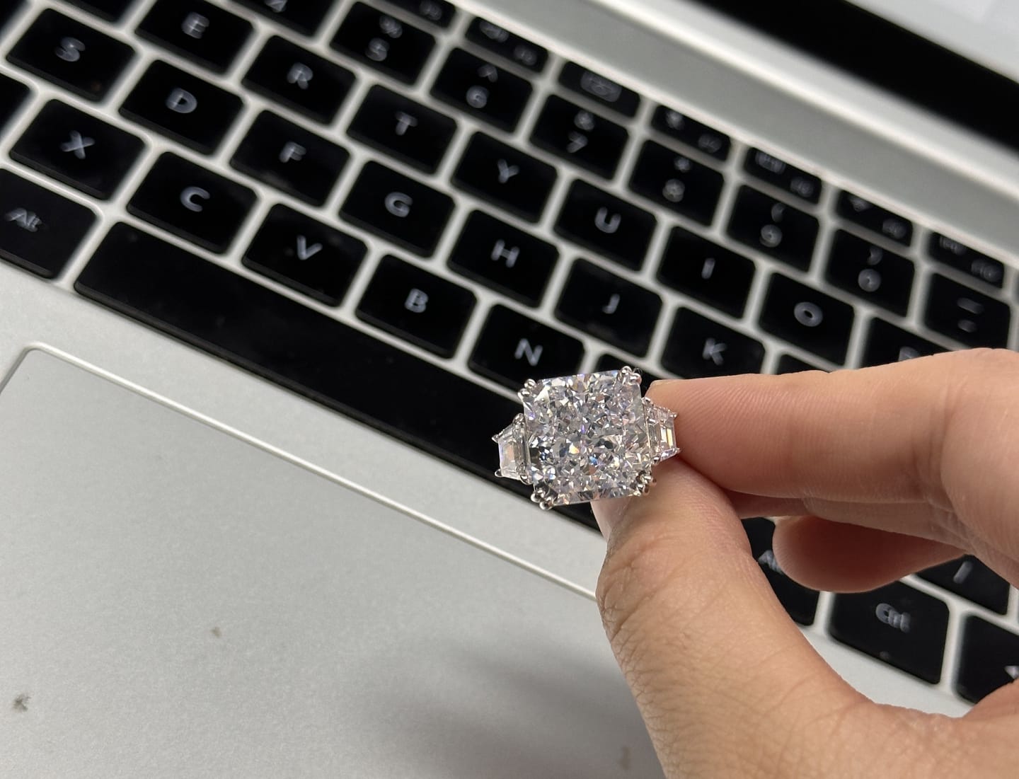 Customer photo review of S925 6.5/12.0 Ct Radiant Cut Crushed Ice Simulated Diamond Three-Stone Engagement Travel Ring